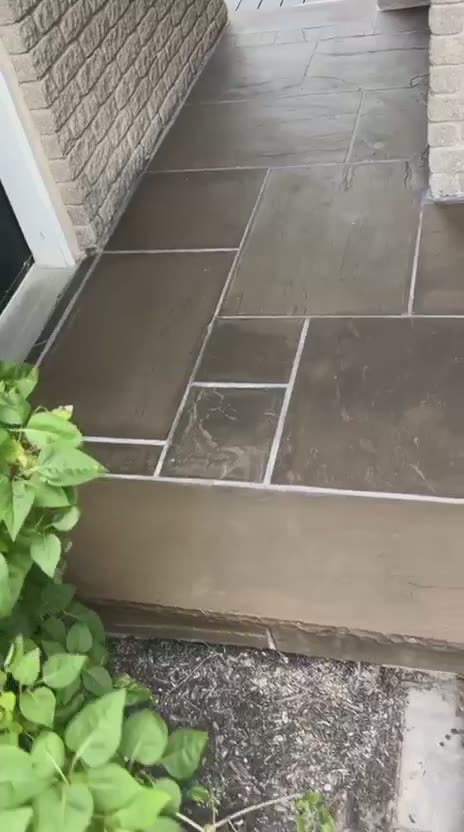 Video of the finished stone landing and steps by the glazed doors