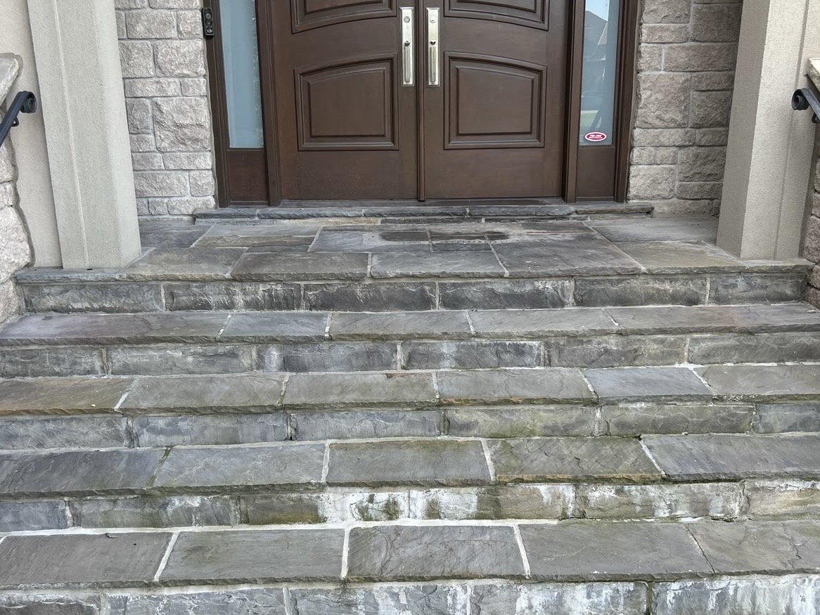 Natural-stone entrance steps before surface work
