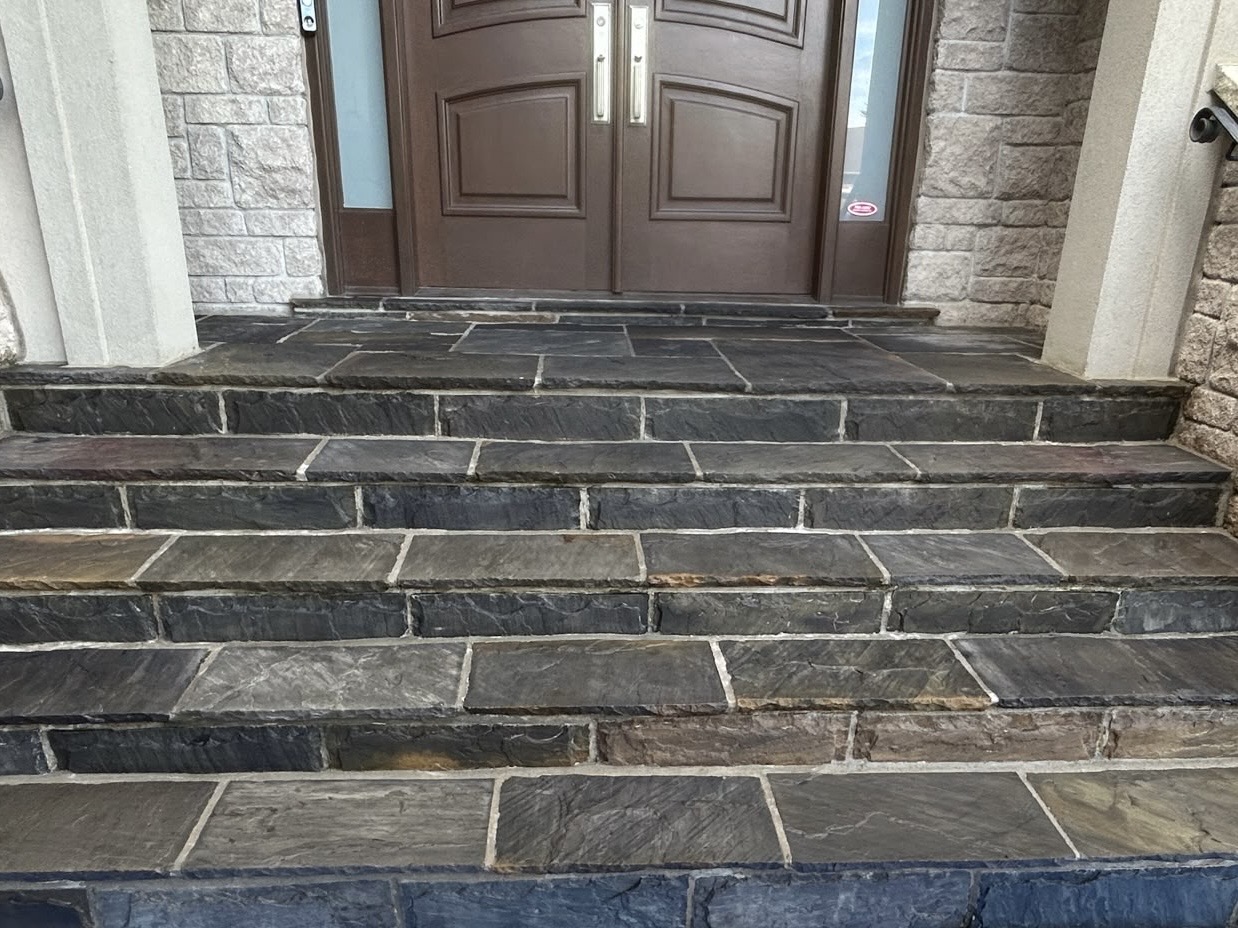 Natural-stone entrance steps after surface work